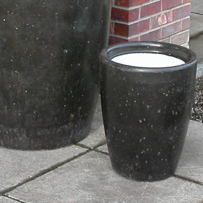 Concrete ash urns and cement cigarette receptacles.