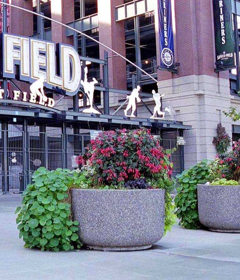 Large concrete street planters and exposed aggregate cement pots from Ornamental Stone Inc.